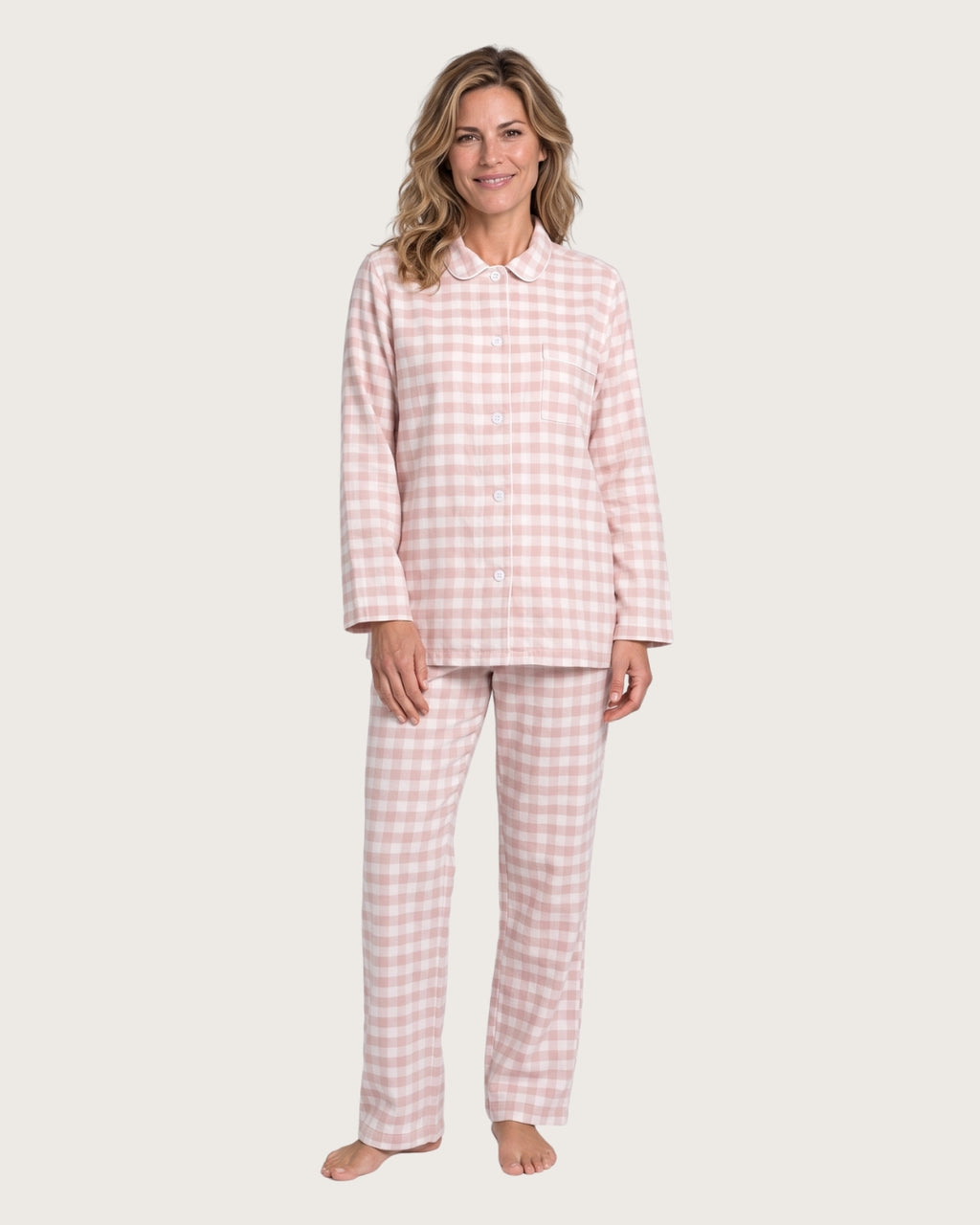 Woman wearing the Faye pink plaid cotton flannel pajama set, full-body front view