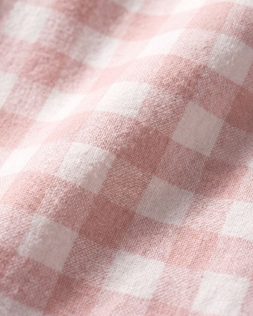 Detailed view of Faye pink-and-white plaid cotton fabric