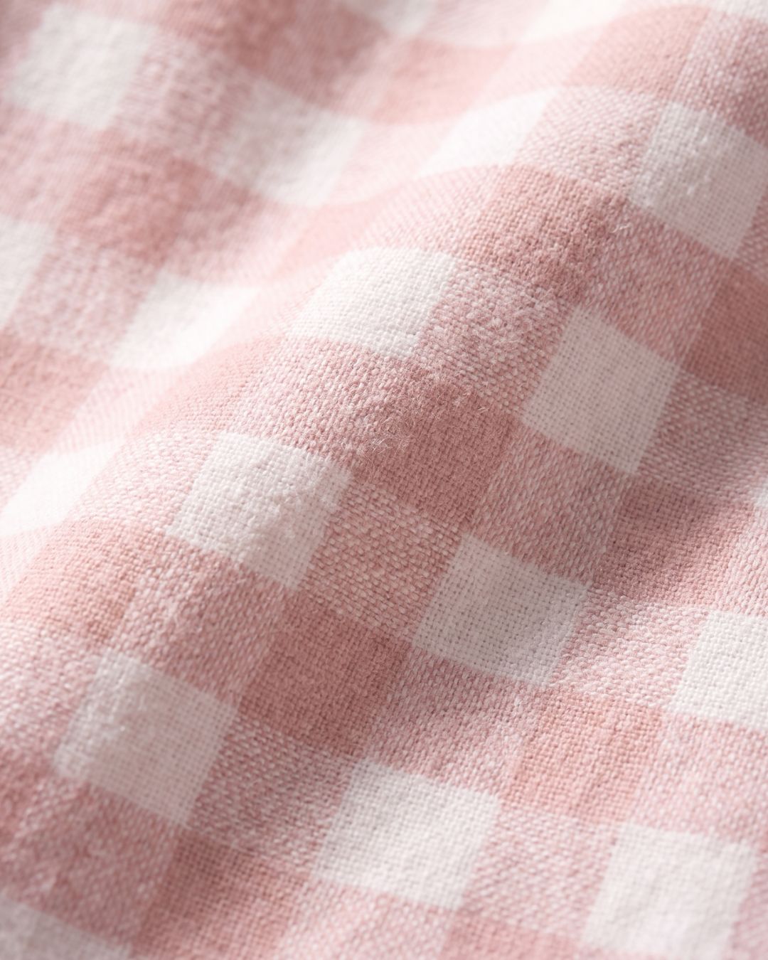 Detailed view of Faye pink-and-white plaid cotton fabric