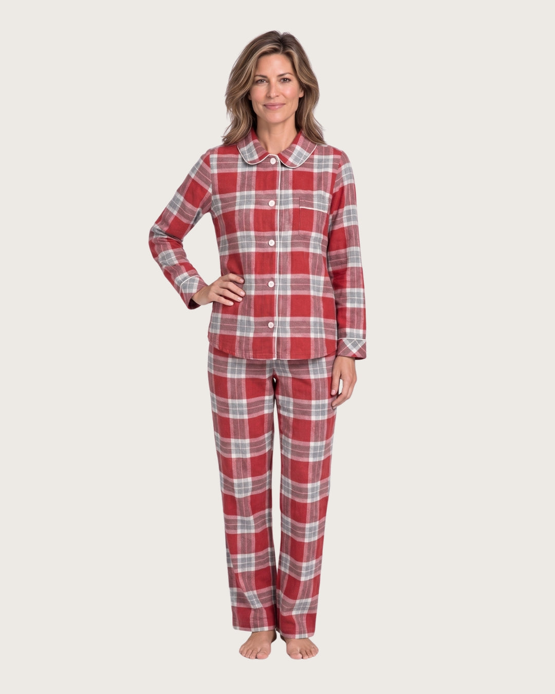 Woman wearing the Rowan red plaid cotton flannel pajama set, full-body front view