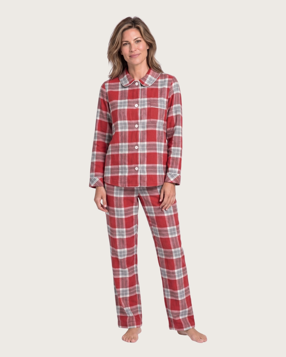 Woman wearing the Rowan red plaid flannel pajamas, three-quarter studio view
