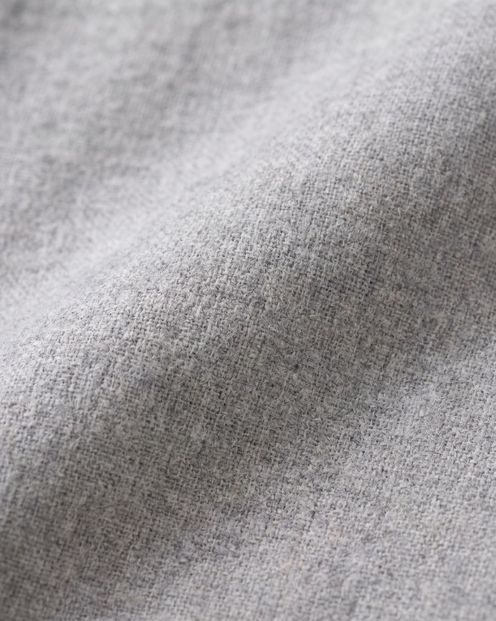 Close-up of soft gray cotton fabric texture on Sage pajama set
